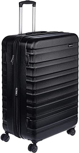 Amazon Basics Maleta rígida expandible: equipaje de viaje ABS con 4 ruedas giratorias dobles; diseño ligero y resistente a los arañazos, 52,6 x 32 x 78 cm, negro